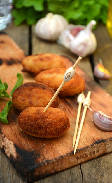 Plate full of home-made croquettes of ham