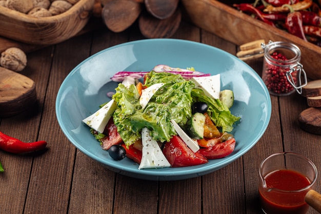 Plate of greek salad with fresh vegetables