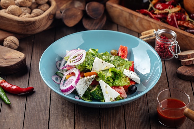 Plate of greek salad with fresh vegetables