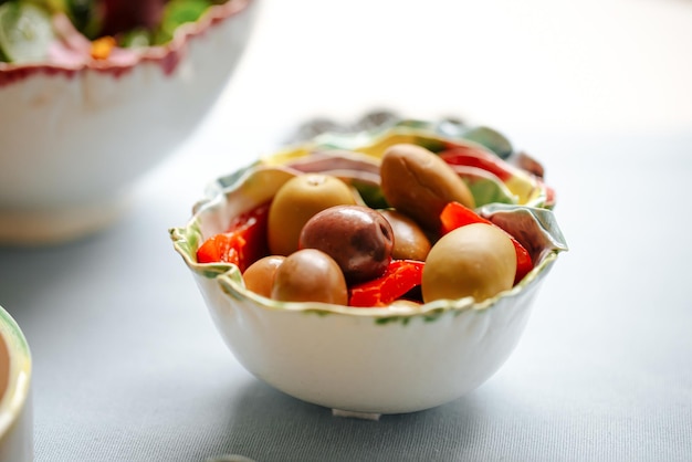 Plate of green olives appetizer