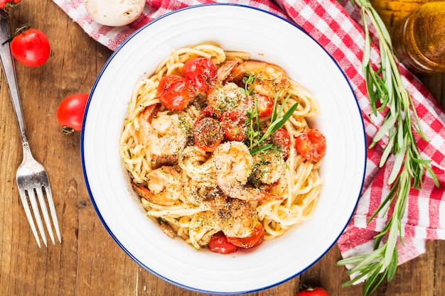 A plate of Italian Seafood shrimp noodles