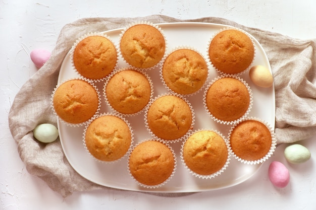 plate of lemon muffins and marzipan eggs 