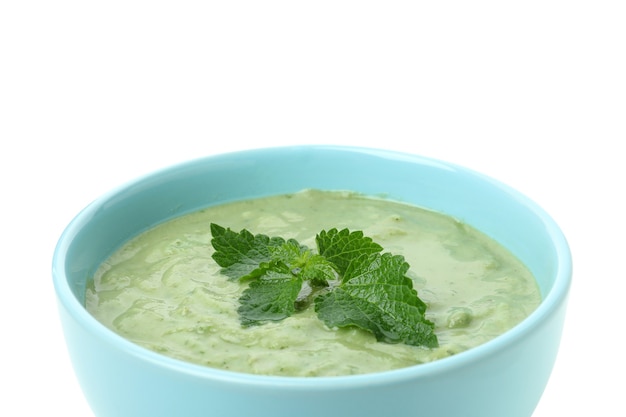 Plate of nettle soup isolated on white background