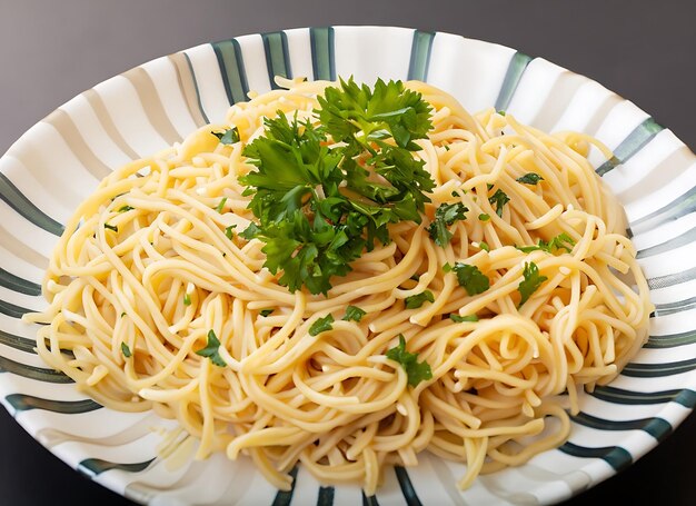 A plate of noodles with parsley on top