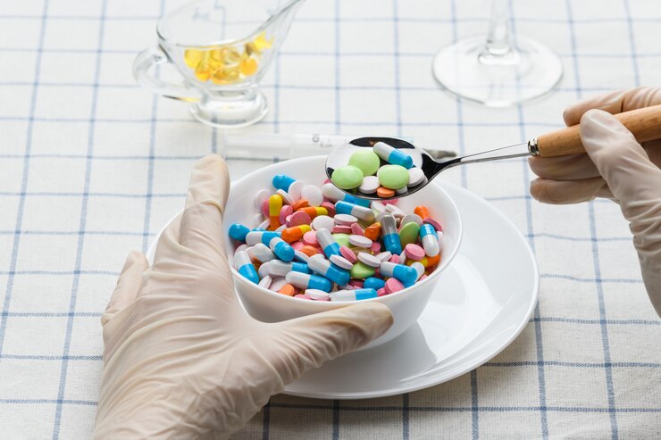 Photo a plate of pills and medications on the table