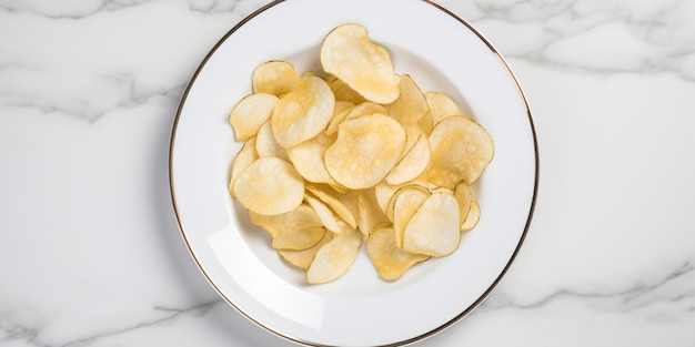 A plate of potato chips on a marble table.