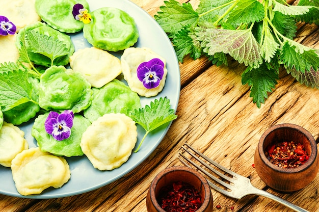 Plate of ravioli with herb