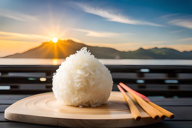 a plate of rice with a pair of chopsticks on it.