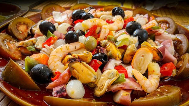 A plate of seafood with shrimps and other seafood