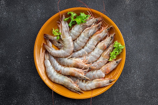 A plate of shrimps on a table
