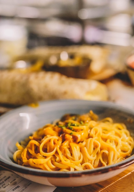 A plate of spaghetti with bolognese sauce.