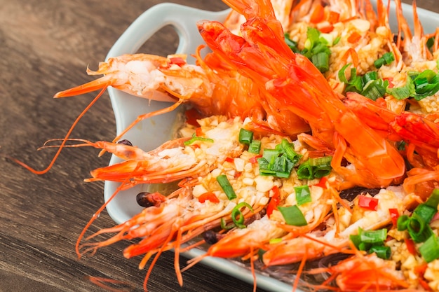 A plate of steamed shrimps with garlic