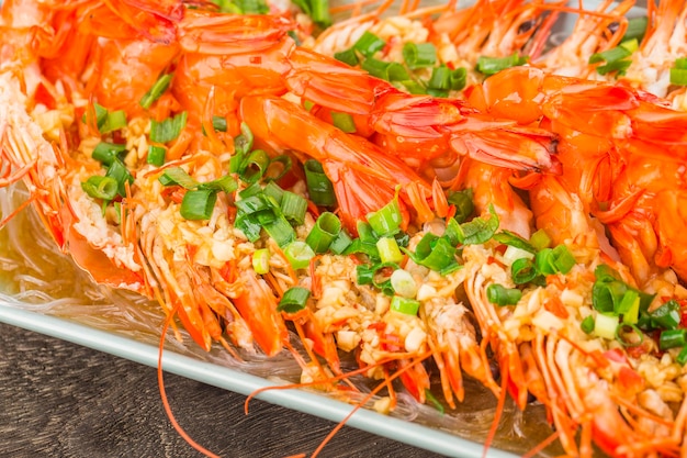 A plate of steamed shrimps with garlic