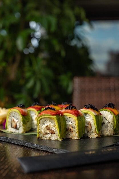 A plate of sushi with a rainbow of colors