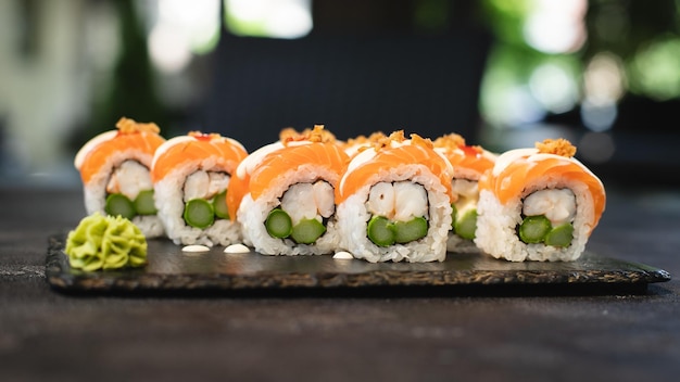 A plate of sushi with a shrimp on it