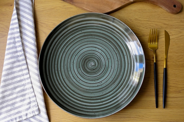 Plate on the table Empty plate with cutlery on the table fork knife plate Cutlery on the table Diet concept Empty table Table with an empty plate