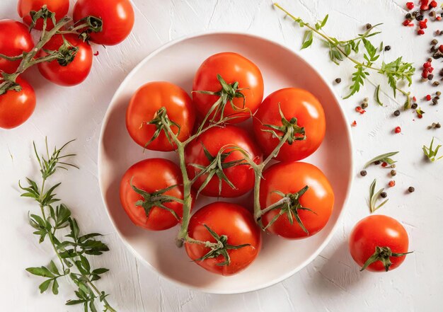 A plate of tomatoes is on a wooden table