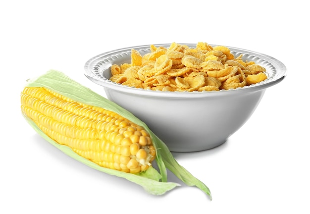 Photo plate with cornflakes and cob on white background