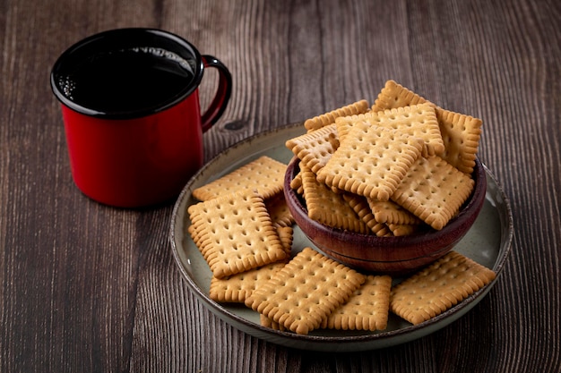 Plate with cornstarch biscuit on the table