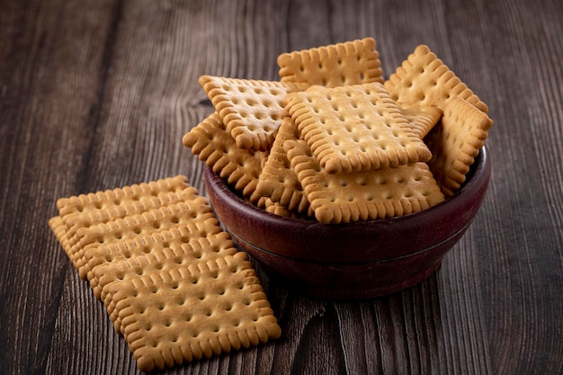 Plate with cornstarch biscuit on the table