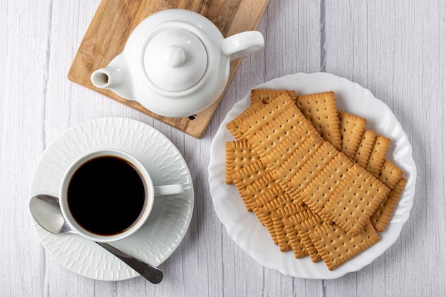 Plate with cornstarch biscuit on the table