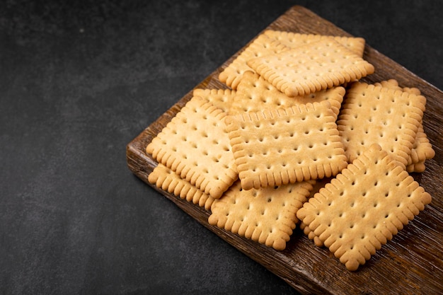 Photo plate with cornstarch biscuit on the table