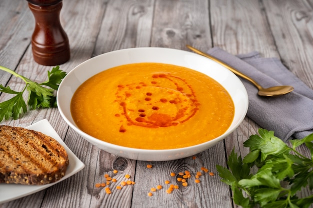 A plate with creamy lentil soup