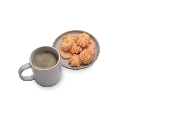 Plate with Danish butter cookies and coffee cup isolated on white background with copy space