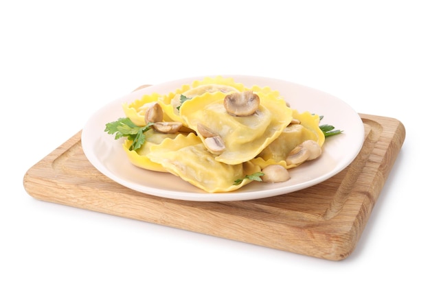 Plate with delicious ravioli isolated on white background