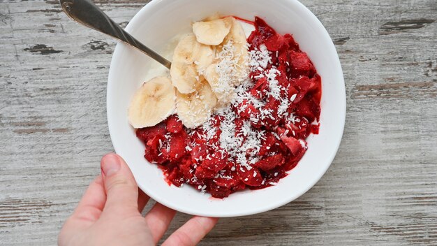 Plate with fresh fruits and coconut