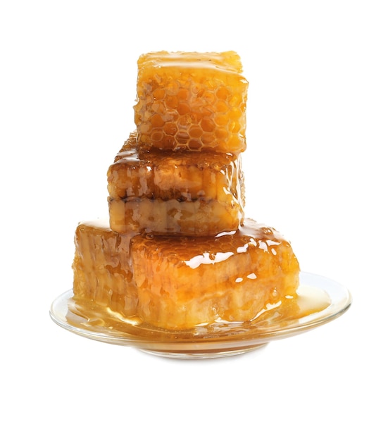 Plate with fresh honeycombs on white background