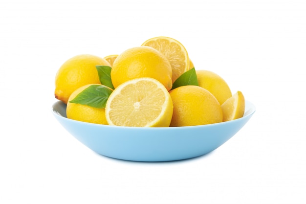 Plate with fresh lemons isolated