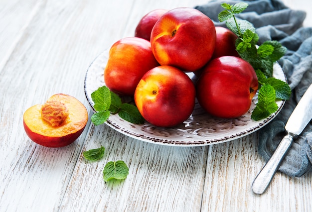 Plate with fresh nectarines