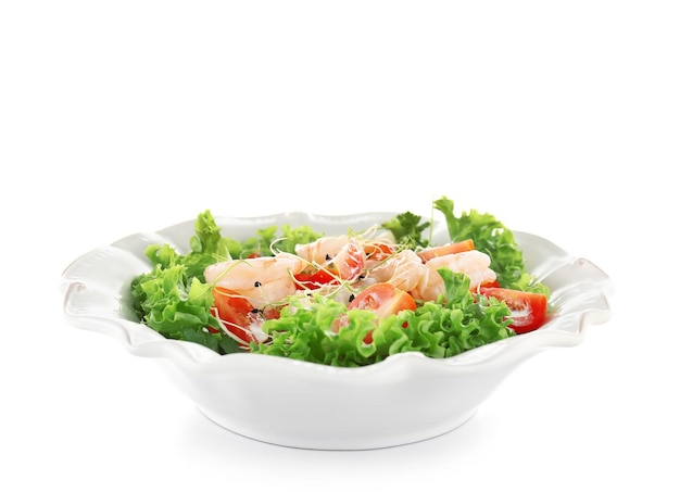 Plate with fresh tasty shrimp salad on white background