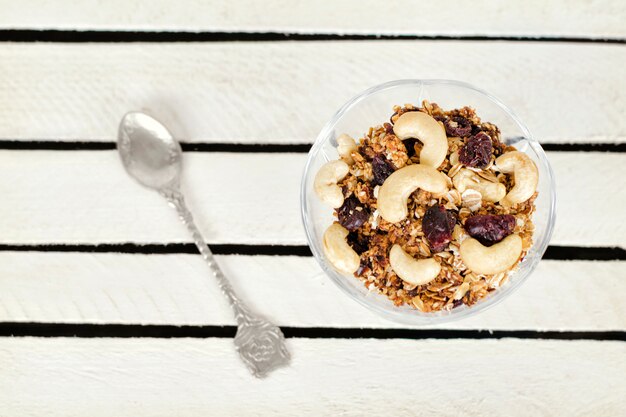 Plate with granola on white plaques. Top view