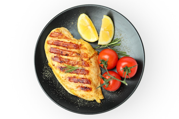 Photo plate with grilled chicken meat isolated on white