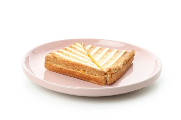 Plate with grilled sandwich isolated on white background