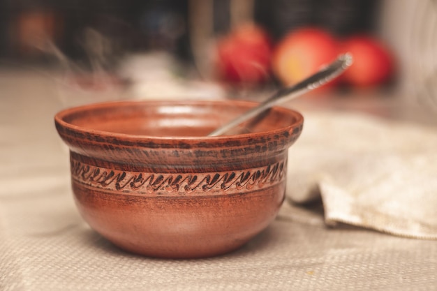 Plate with hot food in the kitchen on the table