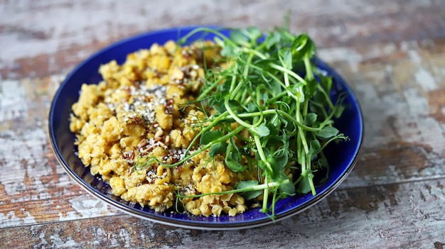 Plate with lentils and microgreens.