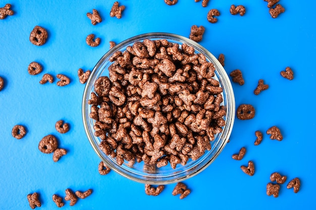 A plate with a quick breakfast of chocolate flakes in the shape of letters back to school septembe