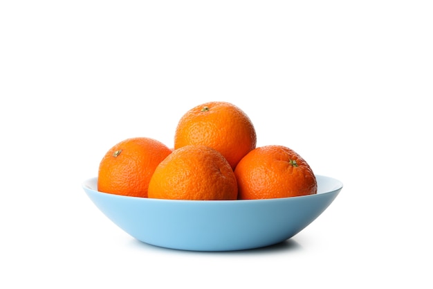 Plate with ripe mandarins isolated on white