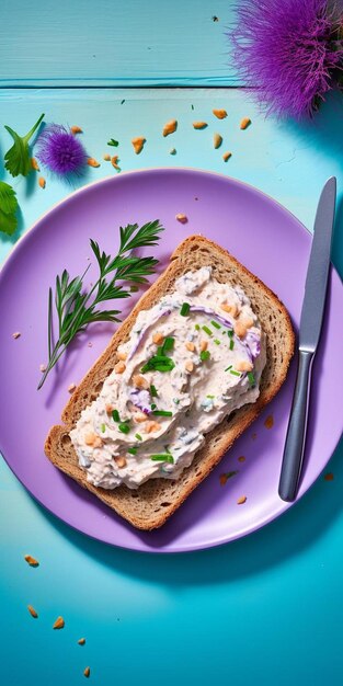 a plate with a sandwich and a knife on it