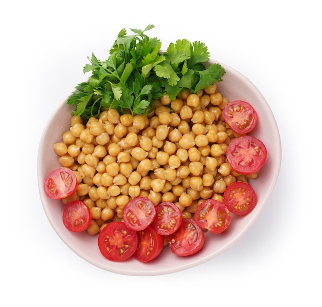 Plate with various raw vegetables and boiled chickpeas