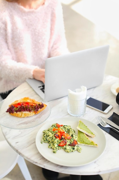 Photo plates with delicious food on table