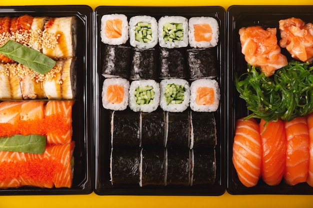 Plates with delicious sushi