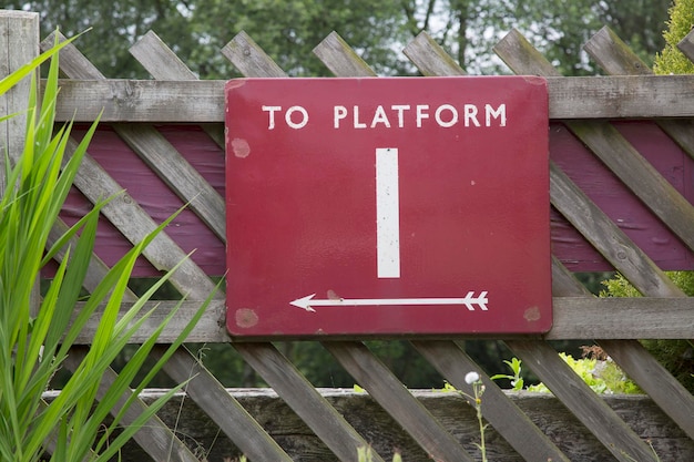 Platform one sign at train station