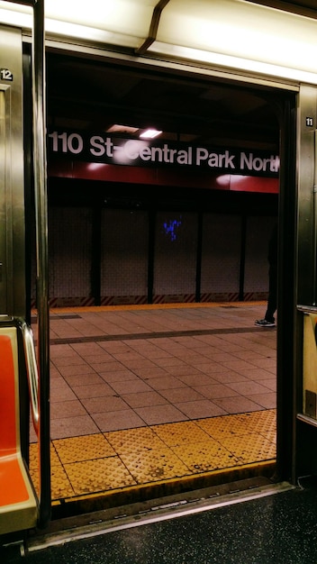 Photo platform seen through open door of subway train