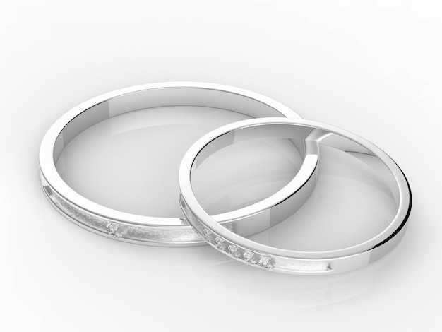 Platinum wedding rings on white background