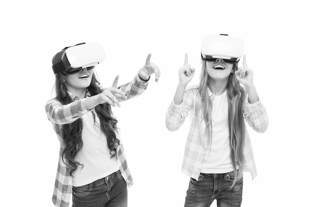Play cyber game and study Modern education Alternative education technologies Virtual education Kids wear hmd explore virtual or augmented reality Girls interact cyber reality Game and fun