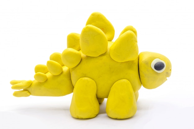 Photo play dough stegosaurus on white background